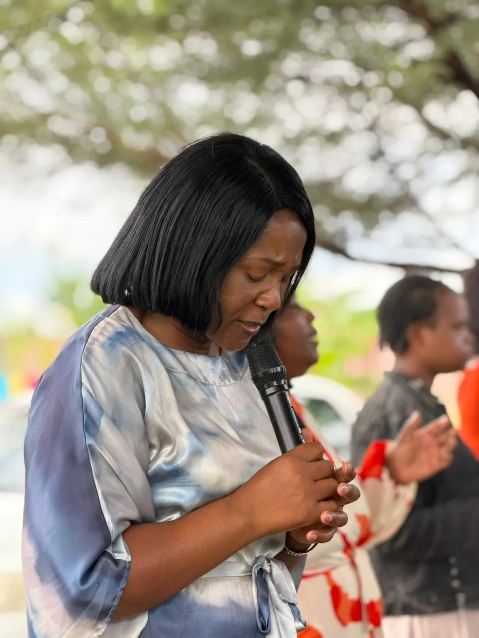 A Truevine church member praying